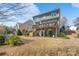 Spacious backyard with a deck and lush greenery at 878 Treasure Ct, Fort Mill, SC 29708