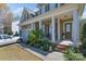 Charming covered front porch with white columns and neat landscaping at 878 Treasure Ct, Fort Mill, SC 29708