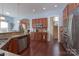 Eat-in kitchen with stainless appliances, granite counters and hardwood floors at 878 Treasure Ct, Fort Mill, SC 29708