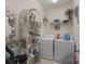 Functional laundry room features modern washer and dryer, neutral walls and tile floor at 878 Treasure Ct, Fort Mill, SC 29708