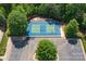 Overhead view of well maintained community tennis court surrounded by greenery at 878 Treasure Ct, Fort Mill, SC 29708