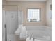 Luxurious bathroom with a soaking tub and separate shower, perfect for relaxation at 9727 Glenburn Ln, Charlotte, NC 28278