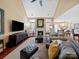 Spacious living room with fireplace, plush furniture, and an open layout that's ideal for entertaining at 9727 Glenburn Ln, Charlotte, NC 28278