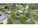 An aerial view showcases neighborhood homes, a water tower, and streets at 101 E Main St, Cleveland, NC 27013
