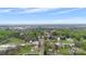 An aerial view of a charming small town showcases tree lined streets and a water tower at 101 E Main St, Cleveland, NC 27013