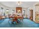 Dining room featuring a round wooden table and a brick fireplace at 101 E Main St, Cleveland, NC 27013