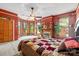 Cozy main bedroom features a fireplace, bay windows, and stylish accents for a warm and inviting space at 101 E Main St, Cleveland, NC 27013