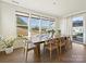 Dining area with natural light, offering a backyard view for an enjoyable meal at 104 Hemlock Cove Ct, Mooresville, NC 28117