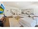 Large sectional sofa perfect for relaxing or entertaining in a well-lit and airy living space at 104 Hemlock Cove Ct, Mooresville, NC 28117