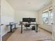 Bright home office with a large window, neutral carpet, and ample workspace at 104 Hemlock Cove Ct, Mooresville, NC 28117