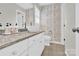 Stylish bathroom featuring floral wallpaper, a modern sink, and elegant fixtures at 105 Beach Ln, Mooresville, NC 28117