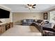 Spacious bonus room with ceiling fan, neutral tones, and carpet flooring at 105 Beach Ln, Mooresville, NC 28117