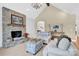 Inviting living room with a stone fireplace, vaulted ceilings, and stylish furnishings at 105 Beach Ln, Mooresville, NC 28117