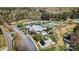 Active community featuring a swimming pool, tennis courts, parking, playground, and green recreational areas at 107 Bare Foot Ln, Mooresville, NC 28117