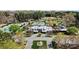Aerial view of community clubhouse, pool, and tennis courts at 107 Bare Foot Ln, Mooresville, NC 28117