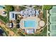 Aerial view of community pool area with tables and fire pit at 107 Bare Foot Ln, Mooresville, NC 28117
