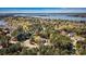 Lake Norman property with wooded lot, lush landscaping, and lake access at 107 Bare Foot Ln, Mooresville, NC 28117