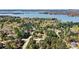 Lake Norman property with wooded lot, lush landscaping, and lake access at 107 Bare Foot Ln, Mooresville, NC 28117