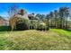 Exterior showing a large backyard with a deck and privacy fence at 107 Bare Foot Ln, Mooresville, NC 28117