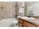 Bathroom featuring a tiled shower, granite countertops, and a wooden vanity at 107 Bare Foot Ln, Mooresville, NC 28117
