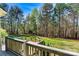 View from deck, overlooking a lawn with mature trees providing privacy at 107 Bare Foot Ln, Mooresville, NC 28117