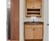 Convenient wet bar featuring wooden cabinets, granite countertop, and a wine rack at 107 Bare Foot Ln, Mooresville, NC 28117