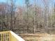 Enjoy a relaxing backyard view from the wooden deck and take in all that nature offers at 1127 Mckay Rd, Newton, NC 28658