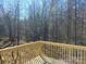 Enjoy a relaxing backyard view from the wooden deck and take in all that nature offers at 1127 Mckay Rd, Newton, NC 28658