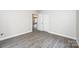 Bedroom with hardwood floors and closet at 1127 Mckay Rd, Newton, NC 28658