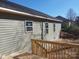 View of the home's exterior from the wooden deck and take in the natural sunlight at 1127 Mckay Rd, Newton, NC 28658