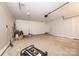 Wide shot of a large garage, featuring an open layout and space for multiple vehicles or storage at 1127 Mckay Rd, Newton, NC 28658