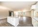 Open concept kitchen with white cabinets, granite countertops, and center island at 1127 Mckay Rd, Newton, NC 28658