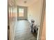 Laundry room with ceramic tile flooring, window and laundry hookups at 1127 Mckay Rd, Newton, NC 28658