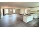 Bright open living room with hardwood floors, white trim, many windows and a ceiling fan at 1127 Mckay Rd, Newton, NC 28658