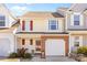 Charming two-story home with a brick facade, front-facing garage, and well-maintained landscaping at 11507 Rabbit Ridge Rd, Charlotte, NC 28270
