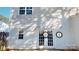 Exterior of house with a back door, small window, and vinyl siding at 11630 Retriever Way, Charlotte, NC 28269