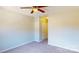 Bright bedroom features neutral walls, ceiling fan, carpet floors, and closet at 11630 Retriever Way, Charlotte, NC 28269