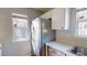 Kitchen with stainless steel refrigerator, stainless steel dishwasher, and modern cabinetry at 11630 Retriever Way, Charlotte, NC 28269