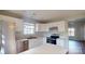 Well-lit kitchen featuring white cabinetry, modern appliances, and ample counter space at 11630 Retriever Way, Charlotte, NC 28269