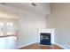 Open living area with a fireplace, wood-look floors, and a bright and airy feel at 11630 Retriever Way, Charlotte, NC 28269