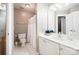 Clean bathroom featuring a white single vanity, toilet, shower with curtain, and a neutral color scheme at 1214 Foxfield Rd, Waxhaw, NC 28173