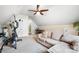 Bonus room featuring a couch, exercise equipment, and a desk in a finished attic at 1214 Foxfield Rd, Waxhaw, NC 28173
