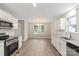 Kitchen with stainless steel appliances, granite countertops and eat in area at 1320 Beaconfield Ct, Rock Hill, SC 29730