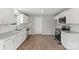 Spacious kitchen featuring granite countertops, stainless appliances and white cabinets at 1320 Beaconfield Ct, Rock Hill, SC 29730