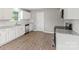 Bright kitchen features granite counters, white cabinets, tile backsplash, and stainless steel appliances at 1320 Beaconfield Ct, Rock Hill, SC 29730