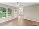 Living room with lots of natural light and wood flooring at 1320 Beaconfield Ct, Rock Hill, SC 29730