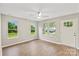 Bright living room with wood floors, white trim, and natural light at 1320 Beaconfield Ct, Rock Hill, SC 29730