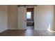 Primary bath showcases a modern soaking tub and tiled walls visible through a barn door at 1429 Coppergate Dr, Salisbury, NC 28147