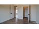 A bright bedroom featuring an open closet and entryways that frame the space with an abundance of natural light at 1429 Coppergate Dr, Salisbury, NC 28147