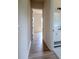 The hallway showcases wood-look flooring, connecting the bedroom and bathroom with an open and flowing layout at 1429 Coppergate Dr, Salisbury, NC 28147